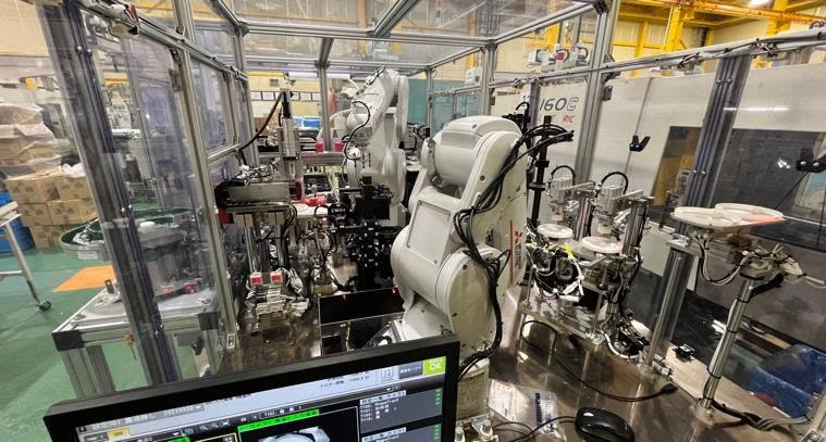 Automated assembly and inspection cell